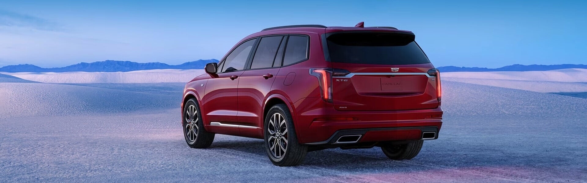 2024 Cadillac XT6 Luxury Mid-Size SUV In Red, Driving In Icy Conditions