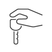 line drawing of hand holding Cadillac key